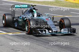 Race winner Nico Rosberg (GER) Mercedes AMG F1 W06 celebrates as he takes the chequered flag at the end of the race. 10.05.2015. Formula 1 World Championship, Rd 5, Spanish Grand Prix, Barcelona, Spain, Race Day.
