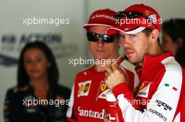 Sebastian Vettel (GER) Ferrari and Kimi Raikkonen (FIN) Ferrari on the drivers parade. 10.05.2015. Formula 1 World Championship, Rd 5, Spanish Grand Prix, Barcelona, Spain, Race Day.