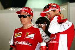 (L to R): Kimi Raikkonen (FIN) Ferrari with team mate Sebastian Vettel (GER) Ferrari on the drivers parade. 10.05.2015. Formula 1 World Championship, Rd 5, Spanish Grand Prix, Barcelona, Spain, Race Day.