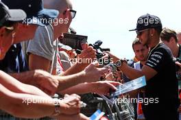 Lewis Hamilton (GBR) Mercedes AMG F1 signs autographs for the fans. 07.05.2015. Formula 1 World Championship, Rd 5, Spanish Grand Prix, Barcelona, Spain, Preparation Day.