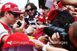 Kimi Raikkonen (FIN) Ferrari signs autographs for the fans. 07.05.2015. Formula 1 World Championship, Rd 5, Spanish Grand Prix, Barcelona, Spain, Preparation Day.