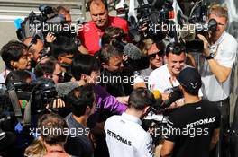 Lewis Hamilton (GBR) Mercedes AMG F1 with Will Buxton (GBR) NBC Sports Network TV Presenter and the media. 07.05.2015. Formula 1 World Championship, Rd 5, Spanish Grand Prix, Barcelona, Spain, Preparation Day.