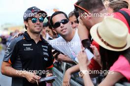 Sergio Perez (MEX) Sahara Force India F1 signs autographs for the fans. 07.05.2015. Formula 1 World Championship, Rd 5, Spanish Grand Prix, Barcelona, Spain, Preparation Day.