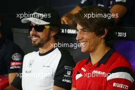 Roberto Merhi (ESP) Manor Marussia F1 Team and Fernando Alonso (ESP) McLaren in the FIA Press Conference. 07.05.2015. Formula 1 World Championship, Rd 5, Spanish Grand Prix, Barcelona, Spain, Preparation Day.