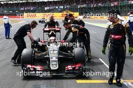 Pastor Maldonado (VEN) Lotus F1 E23 on the grid. 05.07.2015. Formula 1 World Championship, Rd 9, British Grand Prix, Silverstone, England, Race Day.