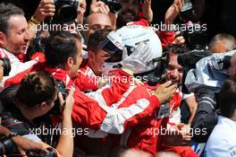 Sebastian Vettel (GER) Ferrari celebrates his third position in parc ferme. 05.07.2015. Formula 1 World Championship, Rd 9, British Grand Prix, Silverstone, England, Race Day.