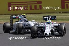 Felipe Massa (BRA) Williams FW37 leads team mate Valtteri Bottas (FIN) Williams FW37. 05.07.2015. Formula 1 World Championship, Rd 9, British Grand Prix, Silverstone, England, Race Day.