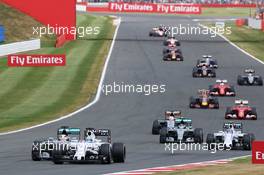 Felipe Massa (BRA) Williams FW37 leads Lewis Hamilton (GBR) Mercedes AMG F1 W06. 05.07.2015. Formula 1 World Championship, Rd 9, British Grand Prix, Silverstone, England, Race Day.