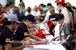 Max Verstappen (NLD) Scuderia Toro Rosso signs autographs for the fans. 04.07.2015. Formula 1 World Championship, Rd 9, British Grand Prix, Silverstone, England, Qualifying Day.