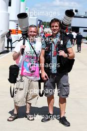 (L to R): Anthony Rew, Photographer, with Russell Batchelor (GBR) XPB Images Photographer. 04.07.2015. Formula 1 World Championship, Rd 9, British Grand Prix, Silverstone, England, Qualifying Day.