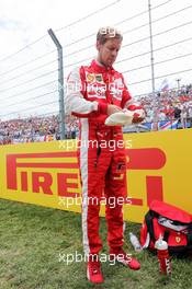 Sebastian Vettel (GER) Ferrari on the grid. 26.07.2015. Formula 1 World Championship, Rd 10, Hungarian Grand Prix, Budapest, Hungary, Race Day.