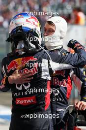 (L to R): Daniel Ricciardo (AUS) Red Bull Racing and Daniil Kvyat (RUS) Red Bull Racing celebrate in parc ferme. 26.07.2015. Formula 1 World Championship, Rd 10, Hungarian Grand Prix, Budapest, Hungary, Race Day.