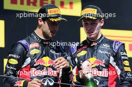 (L to R): third placed Daniel Ricciardo (AUS) Red Bull Racing with second placed team mate Daniil Kvyat (RUS) Red Bull Racing on the podium. 26.07.2015. Formula 1 World Championship, Rd 10, Hungarian Grand Prix, Budapest, Hungary, Race Day.