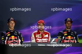 The post race FIA Press Conference (L to R): Daniil Kvyat (RUS) Red Bull Racing, second; Sebastian Vettel (GER) Ferrari, race winner; Daniel Ricciardo (AUS) Red Bull Racing, third.. 26.07.2015. Formula 1 World Championship, Rd 10, Hungarian Grand Prix, Budapest, Hungary, Race Day.