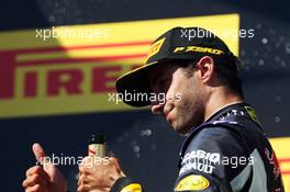 Daniel Ricciardo (AUS) Red Bull Racing celebrates his fourth position on the podium. 26.07.2015. Formula 1 World Championship, Rd 10, Hungarian Grand Prix, Budapest, Hungary, Race Day.