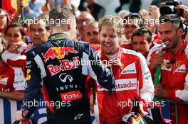 (L to R): Daniil Kvyat (RUS) Red Bull Racing celebrates with race winner Sebastian Vettel (GER) Ferrari in parc ferme. 26.07.2015. Formula 1 World Championship, Rd 10, Hungarian Grand Prix, Budapest, Hungary, Race Day.