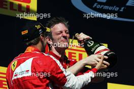 (L to R): Race winner Sebastian Vettel (GER) Ferrari and James Allison (GBR) Ferrari Chassis Technical Director celebrate on the podium. 26.07.2015. Formula 1 World Championship, Rd 10, Hungarian Grand Prix, Budapest, Hungary, Race Day.