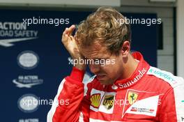 Sebastian Vettel (GER) Ferrari in parc ferme. 25.07.2015. Formula 1 World Championship, Rd 10, Hungarian Grand Prix, Budapest, Hungary, Qualifying Day.