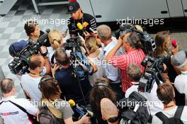 Lewis Hamilton (GBR) Mercedes AMG F1 with the media. 23.07.2015. Formula 1 World Championship, Rd 10, Hungarian Grand Prix, Budapest, Hungary, Preparation Day.
