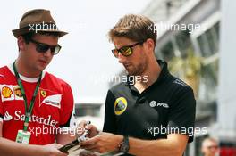 Romain Grosjean (FRA) Lotus F1 Team signs autographs for the fans. 23.07.2015. Formula 1 World Championship, Rd 10, Hungarian Grand Prix, Budapest, Hungary, Preparation Day.