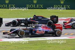 Carlos Sainz Jr (ESP) Scuderia Toro Rosso STR10 runs wide at the start of the race. 06.09.2015. Formula 1 World Championship, Rd 12, Italian Grand Prix, Monza, Italy, Race Day.