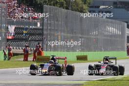 (L to R): Max Verstappen (NLD) Scuderia Toro Rosso STR10 and Jenson Button (GBR) McLaren MP4-30 battle for position. 06.09.2015. Formula 1 World Championship, Rd 12, Italian Grand Prix, Monza, Italy, Race Day.