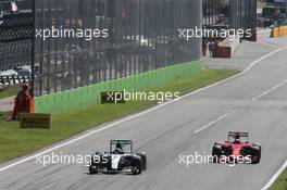 (L to R): Nico Rosberg (GER) Mercedes AMG F1 W06 and Kimi Raikkonen (FIN) Ferrari SF15-T. 06.09.2015. Formula 1 World Championship, Rd 12, Italian Grand Prix, Monza, Italy, Race Day.