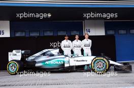 (L to R): Lewis Hamilton (GBR) Mercedes AMG F1; Pascal Wehrlein (GER) Mercedes AMG F1 Reserve Driver; and Nico Rosberg (GER) Mercedes AMG F1 with the Mercedes AMG F1 W06. 01.02.2015. Formula One Testing, Day One, Jerez, Spain.