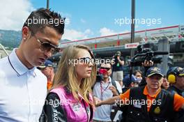 (L to R): Cristiano Ronaldo (POR) Real Madrid Football Player with Cara Delevingne (GBR) Model. 24.05.2015. Formula 1 World Championship, Rd 6, Monaco Grand Prix, Monte Carlo, Monaco, Race Day.
