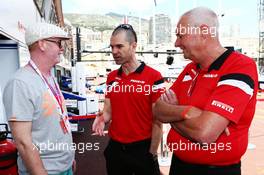 (L to R): Chris Evans (GBR) Broadcaster with Marc Hynes (GBR) Manor Marussia F1 Team Driver Coach and John Booth (GBR) Manor Marussia F1 Team Team Principal. 22.05.2015. Formula 1 World Championship, Rd 6, Monaco Grand Prix, Monte Carlo, Monaco, Friday.