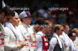 Max Verstappen (NLD) Scuderia Toro Rosso with the drivers as the grid observes the national anthem. 29.03.2015. Formula 1 World Championship, Rd 2, Malaysian Grand Prix, Sepang, Malaysia, Sunday.