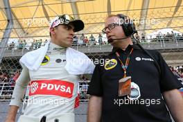 Pastor Maldonado (VEN), Lotus F1 Team and Mark Slade (GBR), Lotus F1 Team, Race Engineer   29.03.2015. Formula 1 World Championship, Rd 2, Malaysian Grand Prix, Sepang, Malaysia, Sunday.