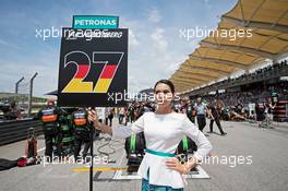Grid girl for Nico Hulkenberg (GER) Sahara Force India F1. 29.03.2015. Formula 1 World Championship, Rd 2, Malaysian Grand Prix, Sepang, Malaysia, Sunday.
