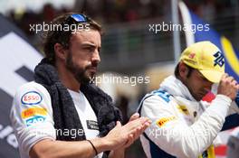 Fernando Alonso (ESP) McLaren with the drivers as the grid observes the national anthem. 29.03.2015. Formula 1 World Championship, Rd 2, Malaysian Grand Prix, Sepang, Malaysia, Sunday.