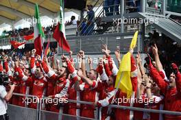 Ferrari celebrates victory at the podium. 29.03.2015. Formula 1 World Championship, Rd 2, Malaysian Grand Prix, Sepang, Malaysia, Sunday.