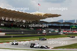 Felipe Massa (BRA) Williams FW37 leads team mate Valtteri Bottas (FIN) Williams FW37. 29.03.2015. Formula 1 World Championship, Rd 2, Malaysian Grand Prix, Sepang, Malaysia, Sunday.