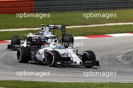 Felipe Massa (BRA) Williams FW37 leads team mate Valtteri Bottas (FIN) Williams FW37. 29.03.2015. Formula 1 World Championship, Rd 2, Malaysian Grand Prix, Sepang, Malaysia, Sunday.