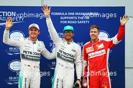 Qualifying top three in parc ferme (L to R): Nico Rosberg (GER) Mercedes AMG F1, third; Lewis Hamilton (GBR) Mercedes AMG F1, pole position; Sebastian Vettel (GER) Ferrari, second. 28.03.2015. Formula 1 World Championship, Rd 2, Malaysian Grand Prix, Sepang, Malaysia, Saturday.