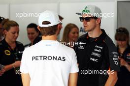 (L to R): Nico Rosberg (GER) Mercedes AMG F1 and Nico Hulkenberg (GER) Sahara Force India F1 on the drivers parade. 29.03.2015. Formula 1 World Championship, Rd 2, Malaysian Grand Prix, Sepang, Malaysia, Sunday.