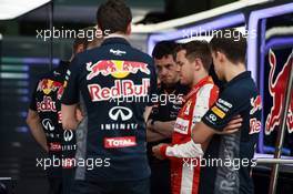 Sebastian Vettel (GER) Ferrari visits the Red Bull Racing pit garage. 26.03.2015. Formula 1 World Championship, Rd 2, Malaysian Grand Prix, Sepang, Malaysia, Thursday.