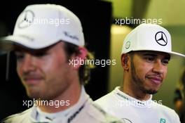 (L to R): Nico Rosberg (GER) Mercedes AMG F1 with team mate Lewis Hamilton (GBR) Mercedes AMG F1. 27.11.2015. Formula 1 World Championship, Rd 19, Abu Dhabi Grand Prix, Yas Marina Circuit, Abu Dhabi, Practice Day.