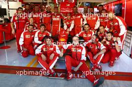 Kimi Raikkonen (FIN) Ferrari at a team photograph. 29.11.2015. Formula 1 World Championship, Rd 19, Abu Dhabi Grand Prix, Yas Marina Circuit, Abu Dhabi, Race Day.