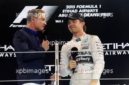 (L to R): David Coulthard (GBR) Red Bull Racing and Scuderia Toro Advisor / BBC Television Commentator on the podium with race winner Nico Rosberg (GER) Mercedes AMG F1. 29.11.2015. Formula 1 World Championship, Rd 19, Abu Dhabi Grand Prix, Yas Marina Circuit, Abu Dhabi, Race Day.