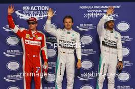 Qualifying top three in parc ferme (L to R): Kimi Raikkonen (FIN) Ferrari, third; Nico Rosberg (GER) Mercedes AMG F1, pole position; Lewis Hamilton (GBR) Mercedes AMG F1, second. 28.11.2015. Formula 1 World Championship, Rd 19, Abu Dhabi Grand Prix, Yas Marina Circuit, Abu Dhabi, Qualifying Day.
