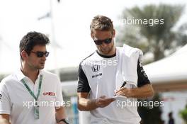 Jenson Button (GBR) McLaren signs autographs for the fans. 26.11.2015. Formula 1 World Championship, Rd 19, Abu Dhabi Grand Prix, Yas Marina Circuit, Abu Dhabi, Preparation Day.