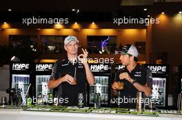 (L to R): Nico Hulkenberg (GER) Sahara Force India F1 and Sergio Perez (MEX) Sahara Force India F1 make cocktails at a Sahara Force India F1 Team Hype Energy MFP Media Event. 26.11.2015. Formula 1 World Championship, Rd 19, Abu Dhabi Grand Prix, Yas Marina Circuit, Abu Dhabi, Preparation Day.