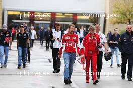 Sebastian Vettel (GER) Ferrari with Britta Roeske (AUT) Ferrari Press Officer. 23.10.2015. Formula 1 World Championship, Rd 16, United States Grand Prix, Austin, Texas, USA, Practice Day.