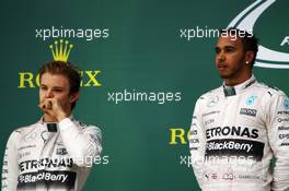 (L to R): Nico Rosberg (GER) Mercedes AMG F1 and team mate Lewis Hamilton (GBR) Mercedes AMG F1 on the podium. 25.10.2015. Formula 1 World Championship, Rd 16, United States Grand Prix, Austin, Texas, USA, Race Day.