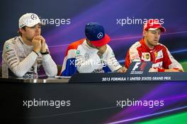 The post race FIA Press Conference (L to R): Nico Rosberg (GER) Mercedes AMG F1, second; Lewis Hamilton (GBR) Mercedes AMG F1, race winner and World Champion; Sebastian Vettel (GER) Ferrari, third. 25.10.2015. Formula 1 World Championship, Rd 16, United States Grand Prix, Austin, Texas, USA, Race Day.