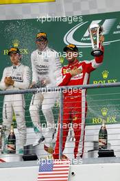 Sebastian Vettel (GER) Ferrari celebrates his third position on the podium. 25.10.2015. Formula 1 World Championship, Rd 16, United States Grand Prix, Austin, Texas, USA, Race Day.